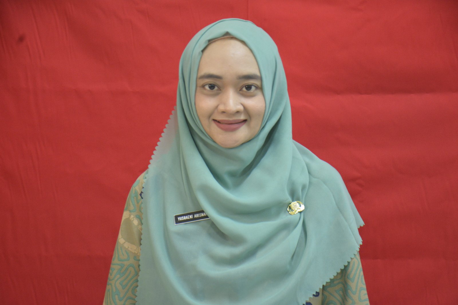 IBU YUSRAENI - GURU BAHASA INDONESIA